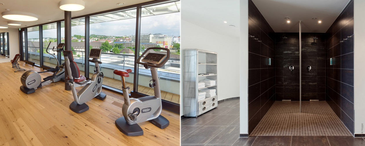 V8 HOTEL Lifestyle-Hotel - Fitness-Geräte in der Fitness-Lounge mit Panorama-Blick, Erlebnis-Duschen und Relax-Liegen.